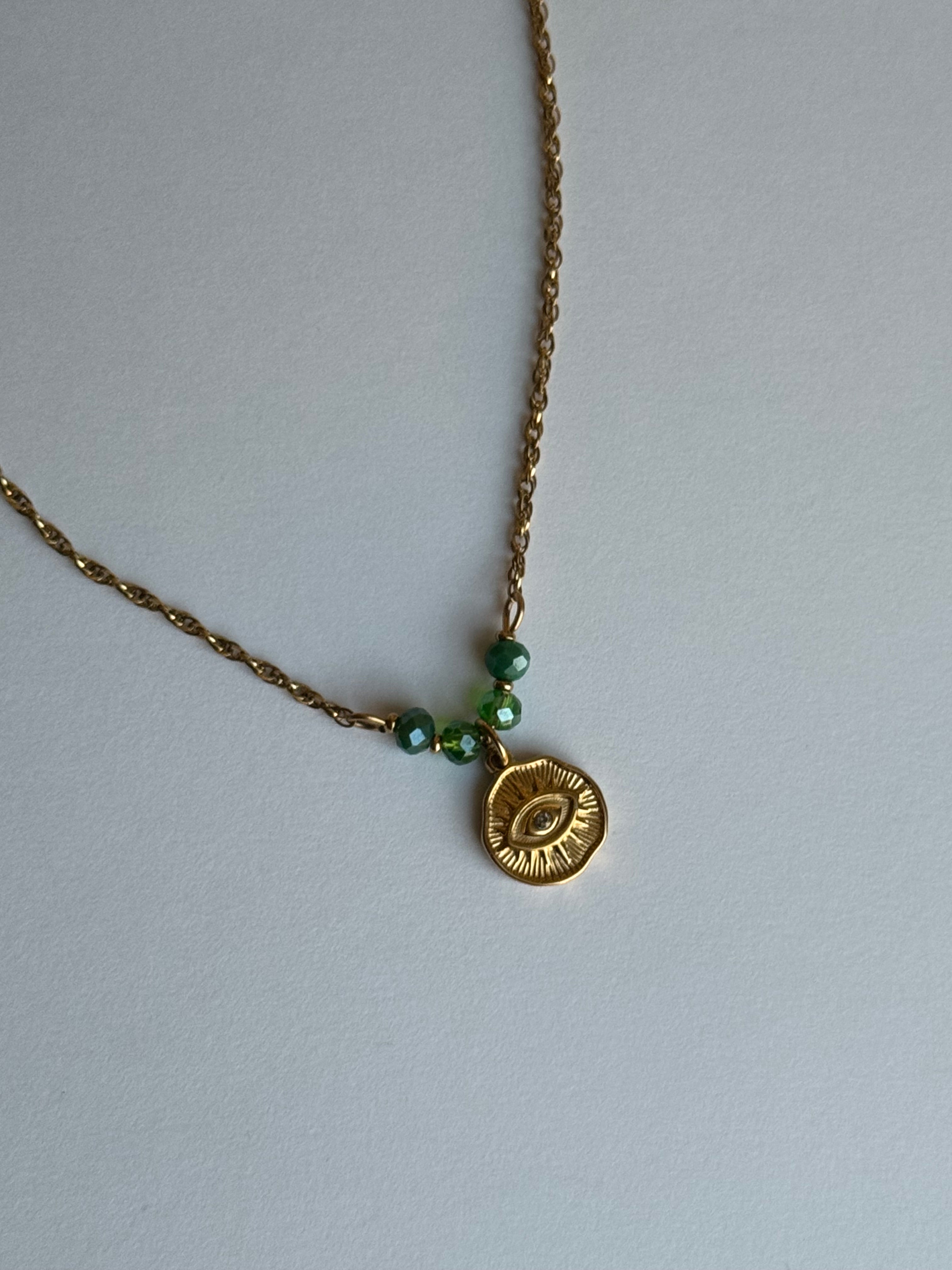 Collier œil à strass